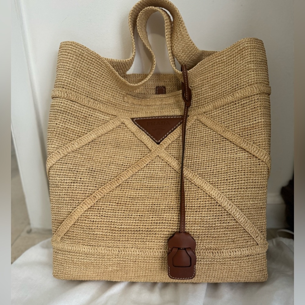 Prada large raffia tote with brown  leather trim, open top, & removable pouch